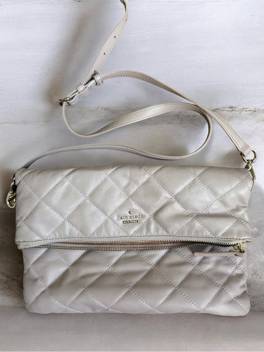 kate spade Quilted Fold-Over Crossbody Bag in Light Cream with Gold Hardware